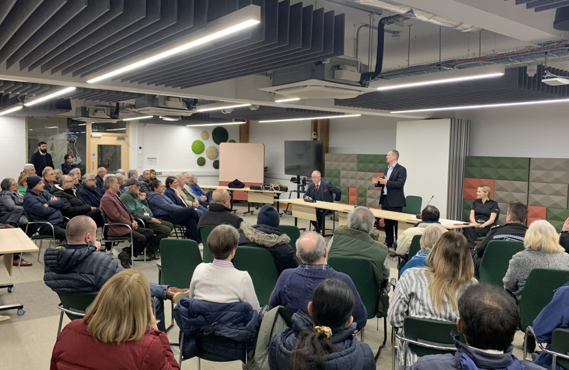 Neil, police officer, and Rupert Matthews, at a meeting