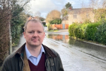 Neil at the site of flooding in Great Glen