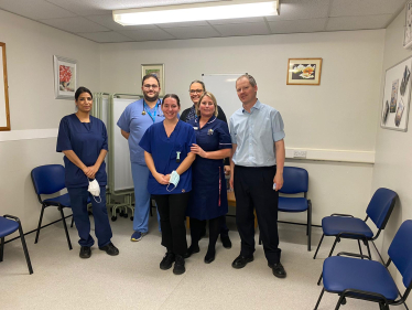 Neil O'Brien with other NHS staff