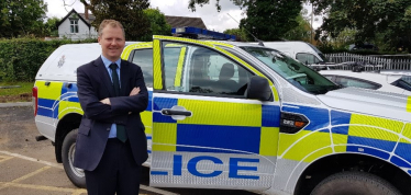 Neil with a new police car