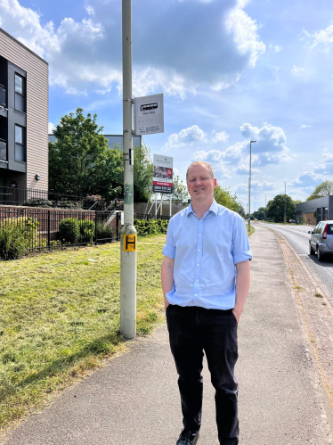 Neil at bus stop