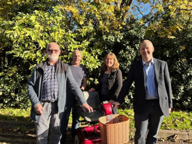 Neil with Shopmobility volunteers at Roman Way